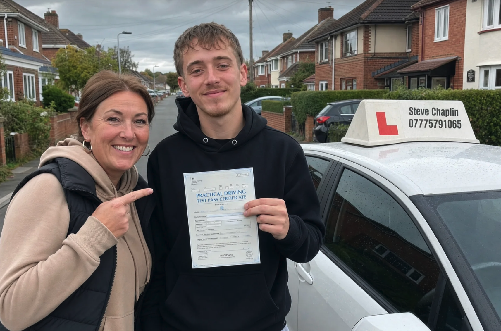 Claire & Jake celebrating their driving test pass